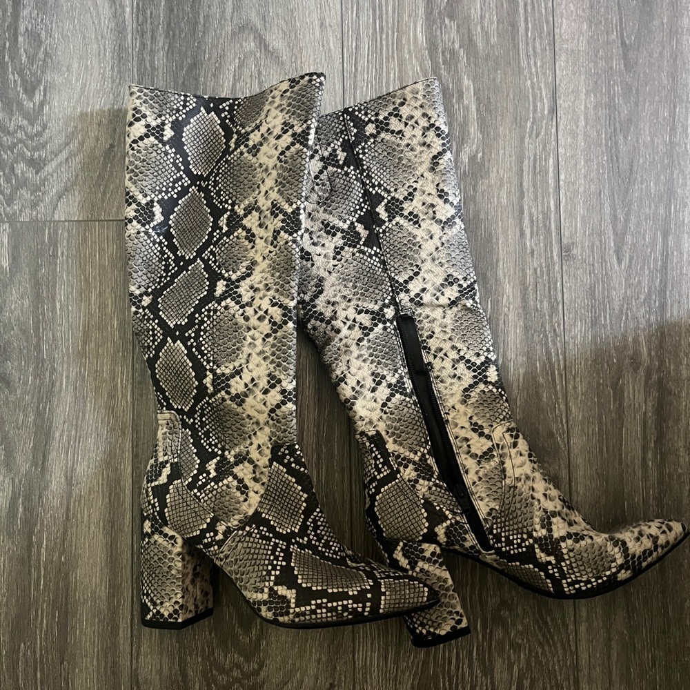 Knee high snake skin boots